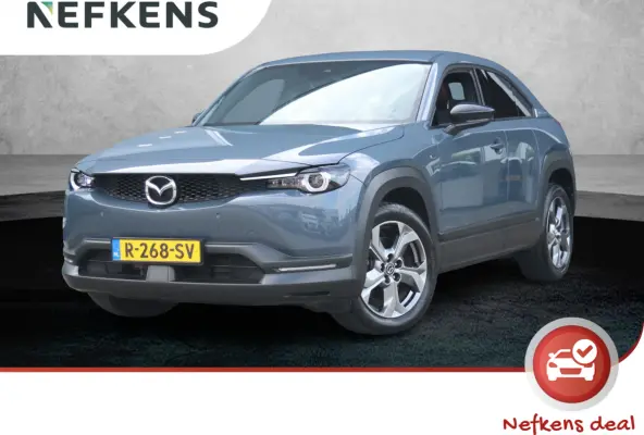 e-SkyActiv EV 145 Advantage 36 kWh Camera | ACCU 95% | Elektrisch verstelbare stoelen | LEER | Stoelverwarming | Navigatie | Climate Control Tweezeidig | Apple CarPlay & Android Auto