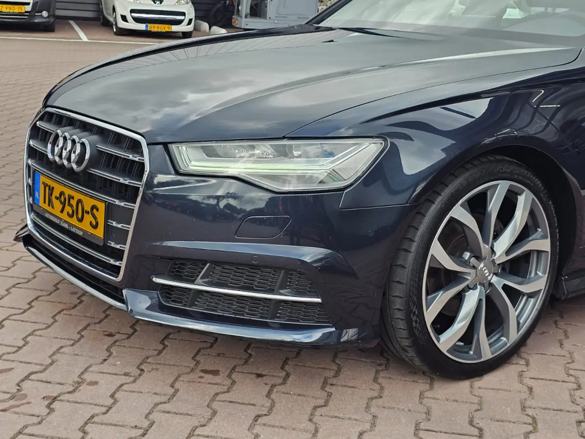 1.8 TFSI Ultra Advance Sport | Automaat | S-line | Navi | Elek. achterklep | Keyless | Sportstoelen | PDC voor + achter | Zwarte hemel |