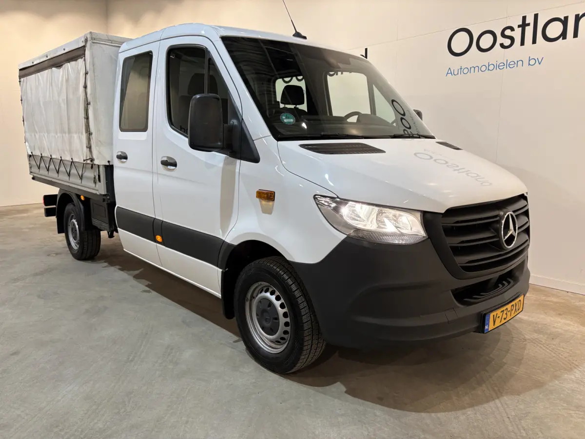 317 CDI L2 RWD DC Open Laadbak met Huif en schuifzeilen / Airco / Cruise / Mbux / Trekhaak