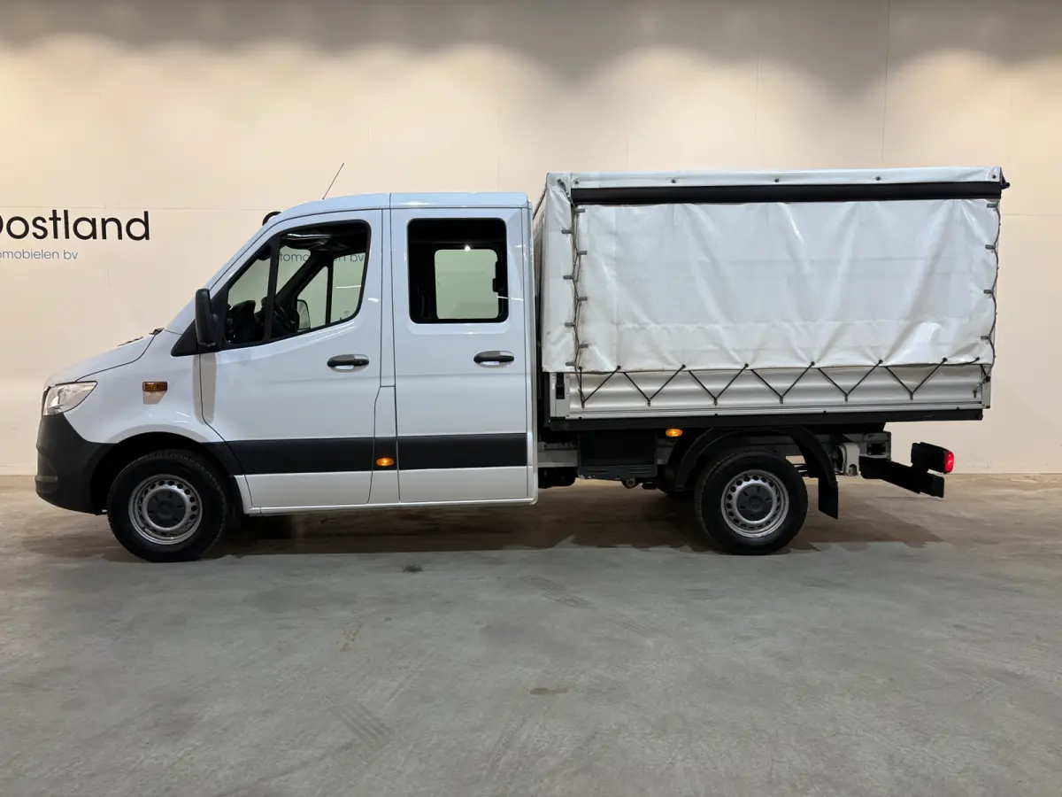 317 CDI L2 RWD DC Open Laadbak met Huif en schuifzeilen / Airco / Cruise / Mbux / Trekhaak
