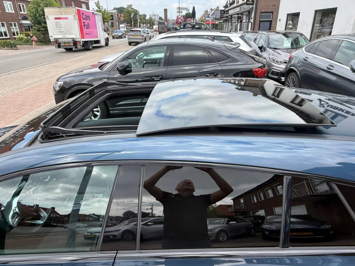 180 Business Solution AMG,NL-auto,Panoramadak,Ambient,Stoelverwarming,Navigatie