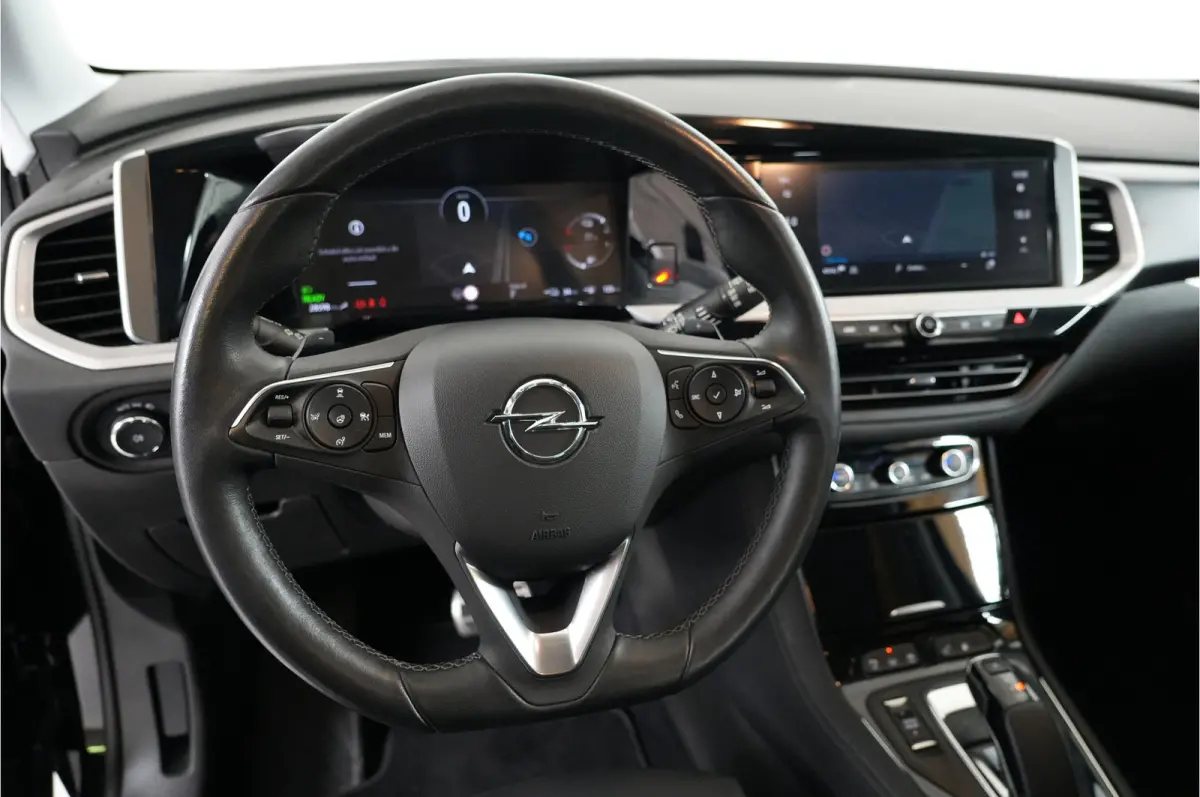 1.6 Turbo GS Line 225 pk PHEV | SOH 100% | Trekhaak | Leder | 360 Cam | Stl. verw./verk. | El. achterklep  | Adaptive Cruise |