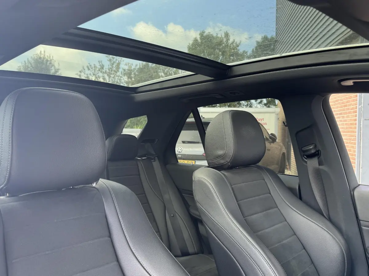 350 E 4MATIC PREMIUM PLUS I DEALER ONDERHOUDEN I BURMESTER I APPLE CARPLAY I TREKHAAK I P-CAMERA