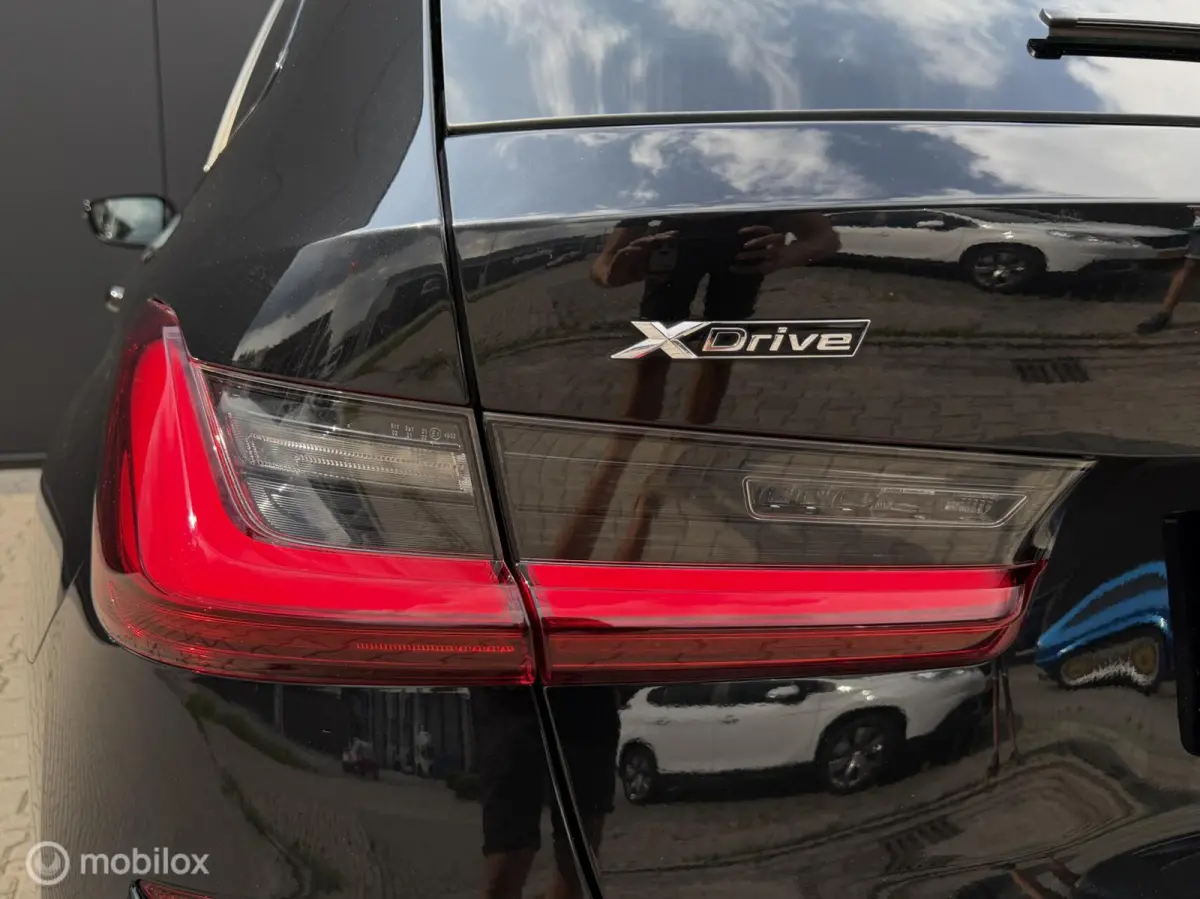 330e Touring xDrive M-pakket/Laser/Pano/Trekhaak/ACC/19 inch