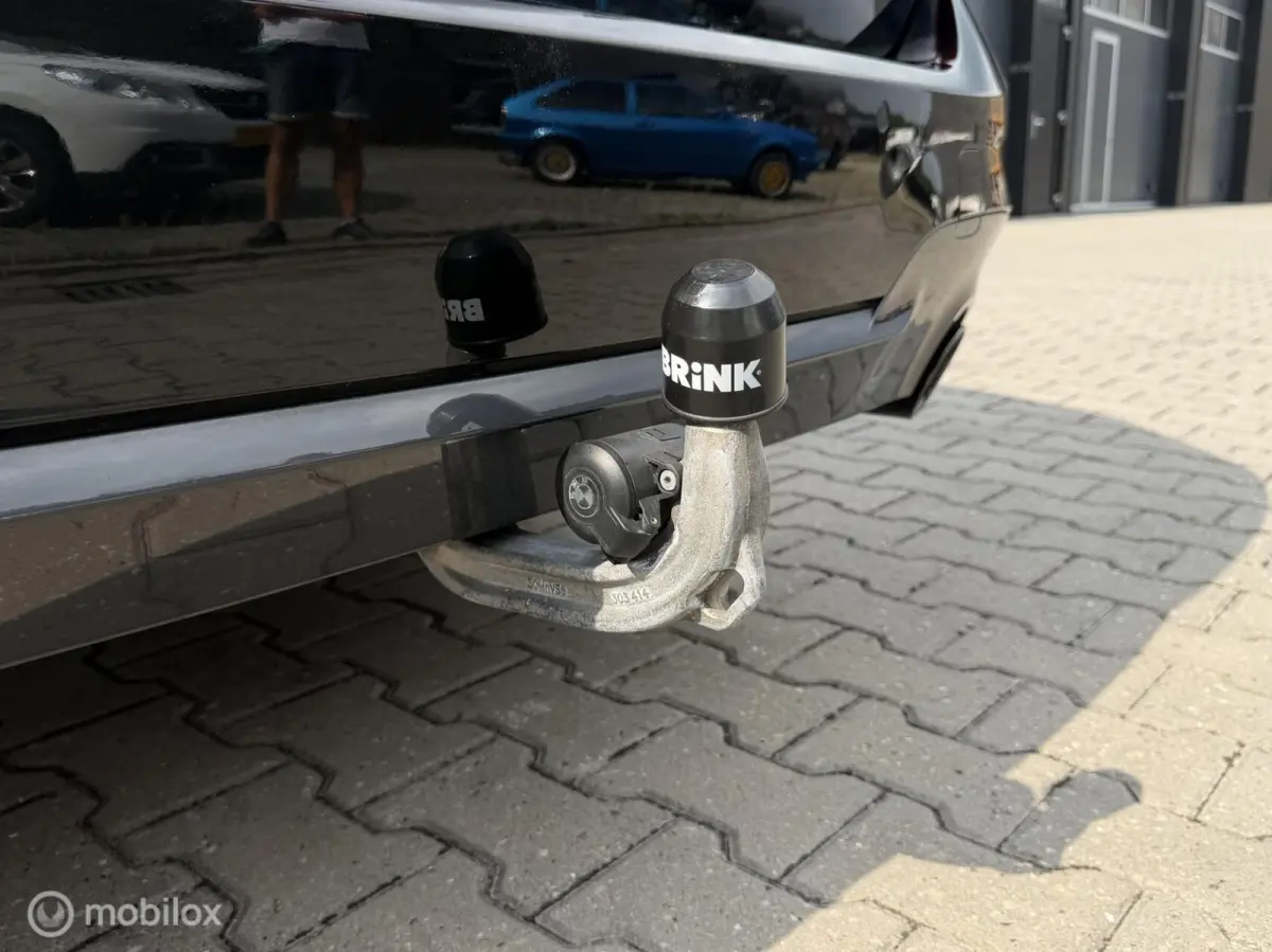 330e Touring xDrive M-pakket/Laser/Pano/Trekhaak/ACC/19 inch
