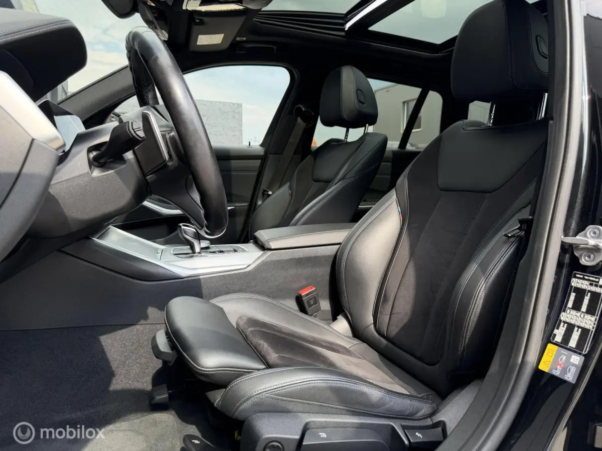 330e Touring xDrive M-pakket/Laser/Pano/Trekhaak/ACC/19 inch