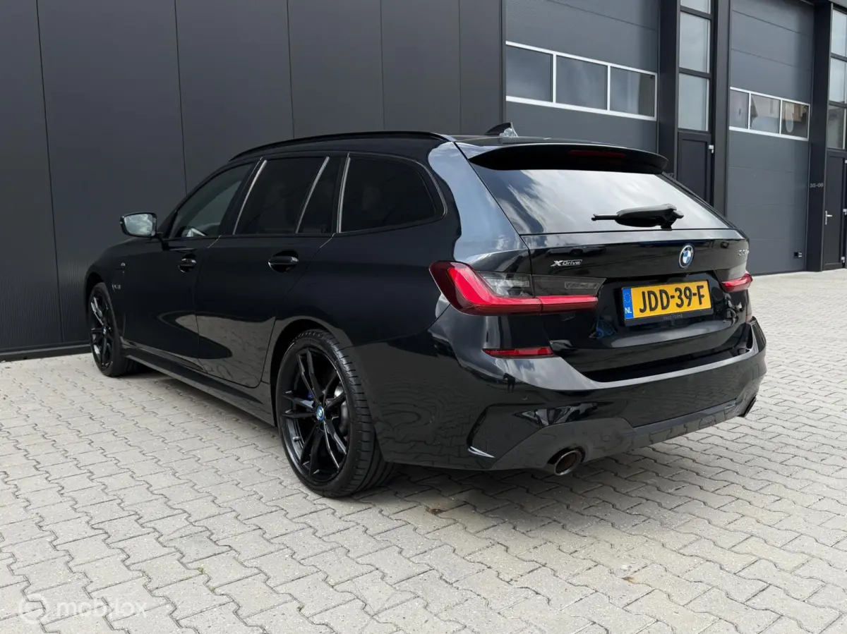 330e Touring xDrive M-pakket/Laser/Pano/Trekhaak/ACC/19 inch
