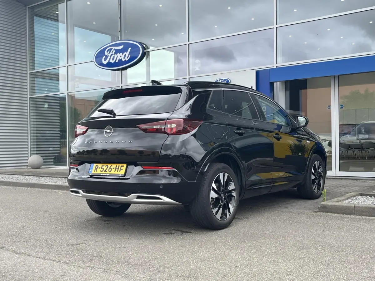 1.2 Turbo Business Elegance | Climate Control | Cruise Control | Achteruitrijcamera | Elektrisch Bedienbare Achterklep | Navigatie | Dodehoekdetectie | Apple Carplay/ Android Auto |