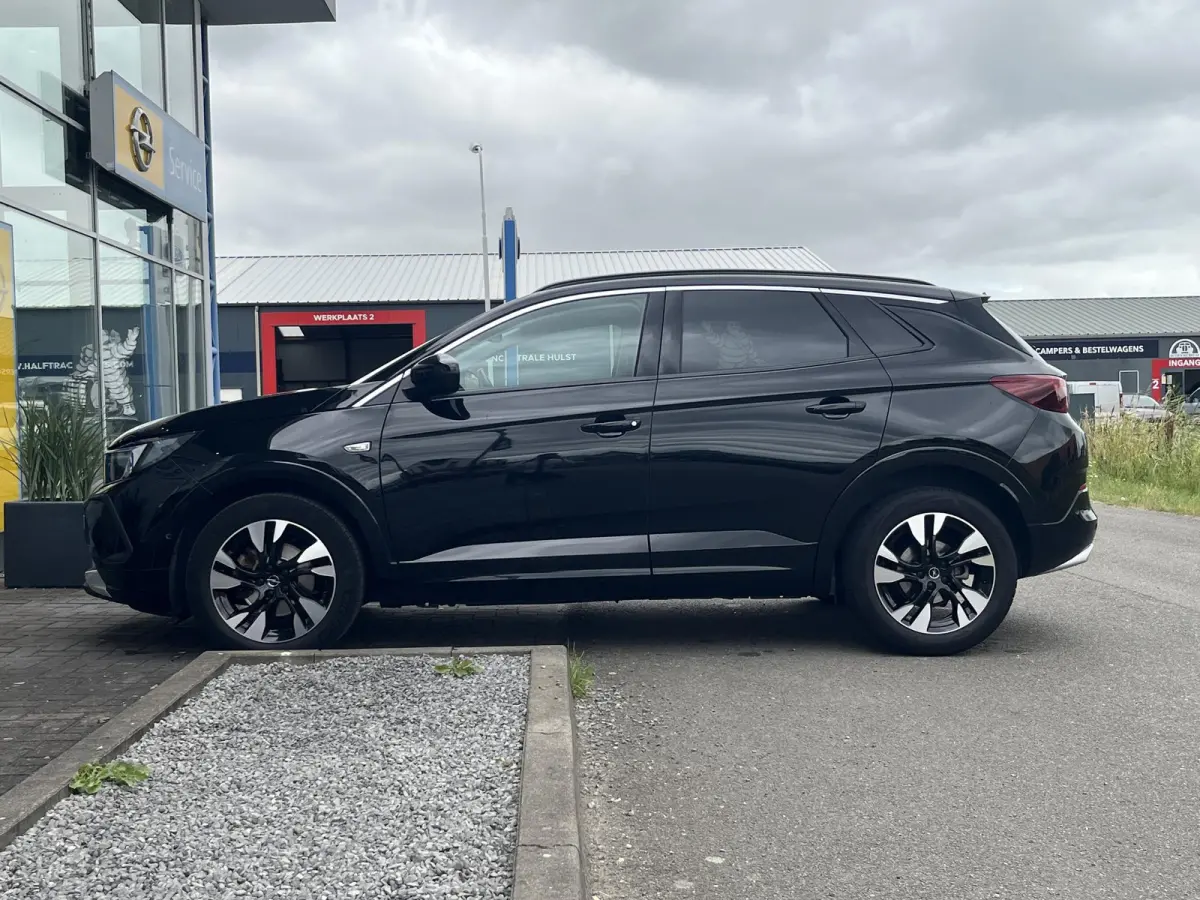 1.2 Turbo Business Elegance | Climate Control | Cruise Control | Achteruitrijcamera | Elektrisch Bedienbare Achterklep | Navigatie | Dodehoekdetectie | Apple Carplay/ Android Auto |