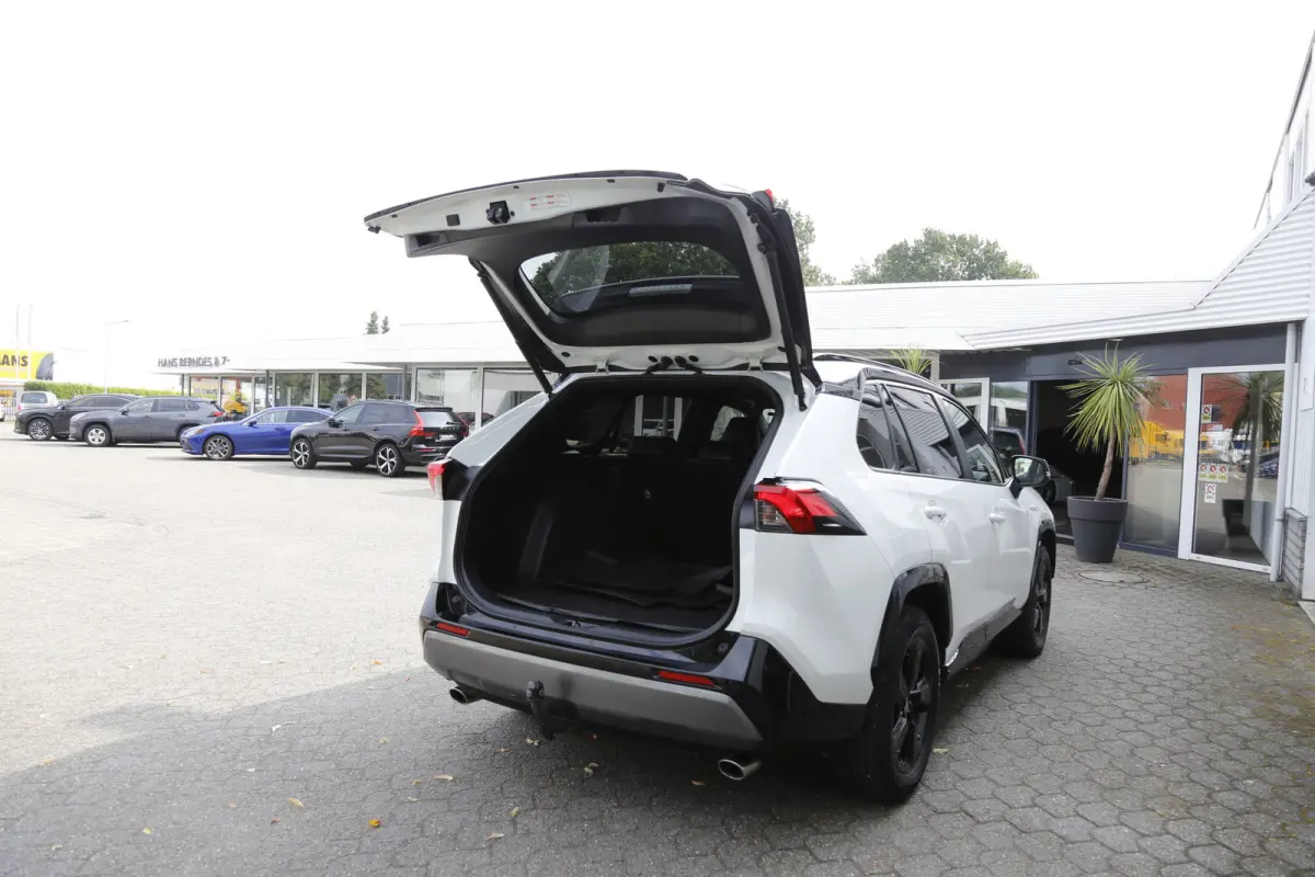 2.5 Hybrid Bi-Tone*Fabrieksgarantie t/m01-2030*Perfect Toyota onderh.*Parelmoer Wit/Trekhaak/Half Leder/Stoelverw./Stuurverw./Elek. Klep/Keyless Entry+Go/Camera/Parkeersens./18 inch LM*