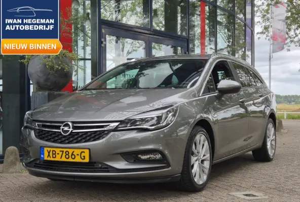 1.0 Online Edition | Apple Carplay | Navigatie | Climate Control | Parkeersensoren + Camera | Cruise Control