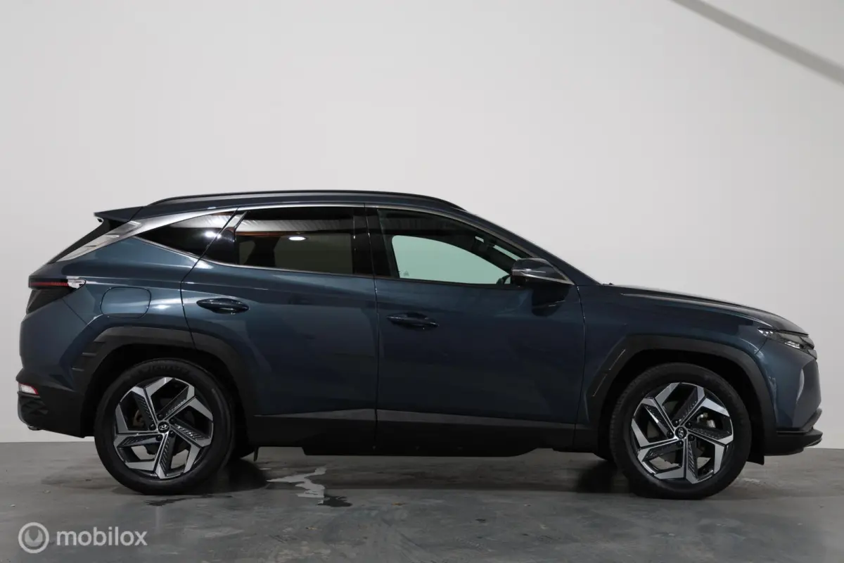 1.6 T-GDI PHEV Comfort Smart 4WD - Stuur/Stoelverwarming en ventilatie - Carplay - Trekhaak