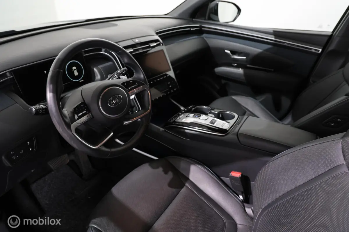 1.6 T-GDI PHEV Comfort Smart 4WD - Stuur/Stoelverwarming en ventilatie - Carplay - Trekhaak
