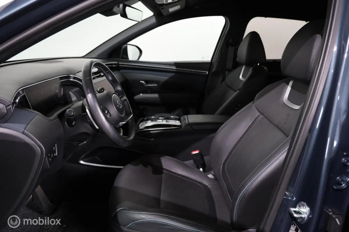 1.6 T-GDI PHEV Comfort Smart 4WD - Stuur/Stoelverwarming en ventilatie - Carplay - Trekhaak