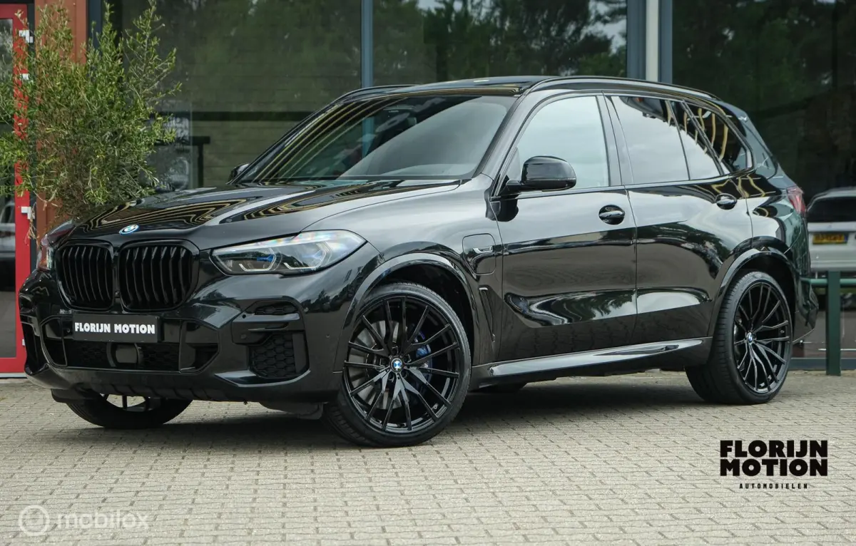 xDrive45e High Executive | M-pakket | Laser | Pano | M-technik zetels| Stoelverwarming en ventilatie | Trekhaak | 360 camera | Dealer onderhouden | 22 Inch | Ambient | DAB+