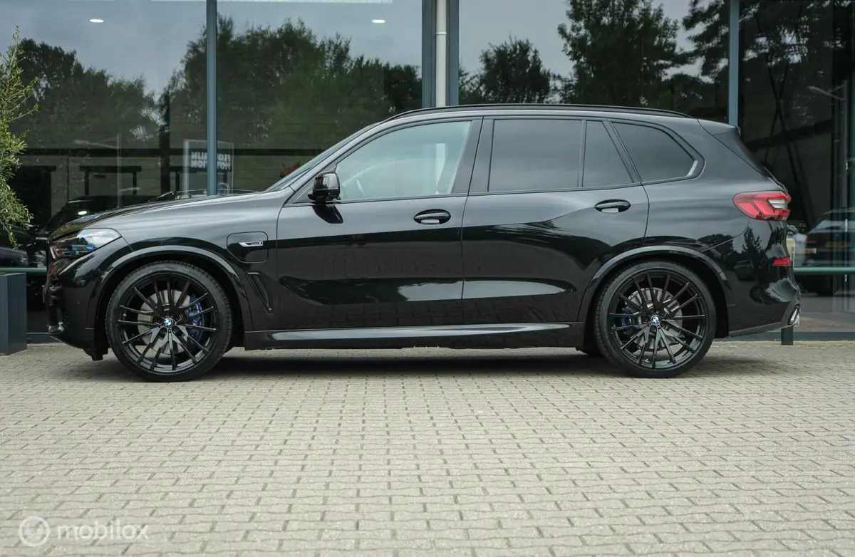 xDrive45e High Executive | M-pakket | Laser | Pano | M-technik zetels| Stoelverwarming en ventilatie | Trekhaak | 360 camera | Dealer onderhouden | 22 Inch | Ambient | DAB+
