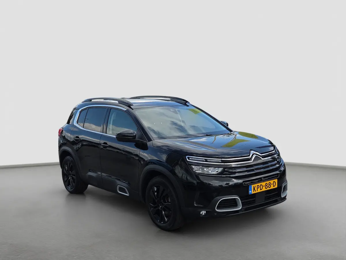 1.6 Plug-in Hybrid 225 Business Plus Panoramadak | Trekhaak | Elektrische stoelverstelling + memory | Voor en achter camera | Voorstoelen verwarmd