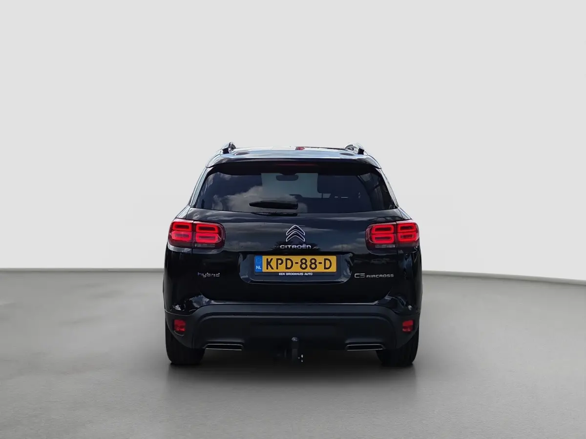 1.6 Plug-in Hybrid 225 Business Plus Panoramadak | Trekhaak | Elektrische stoelverstelling + memory | Voor en achter camera | Voorstoelen verwarmd