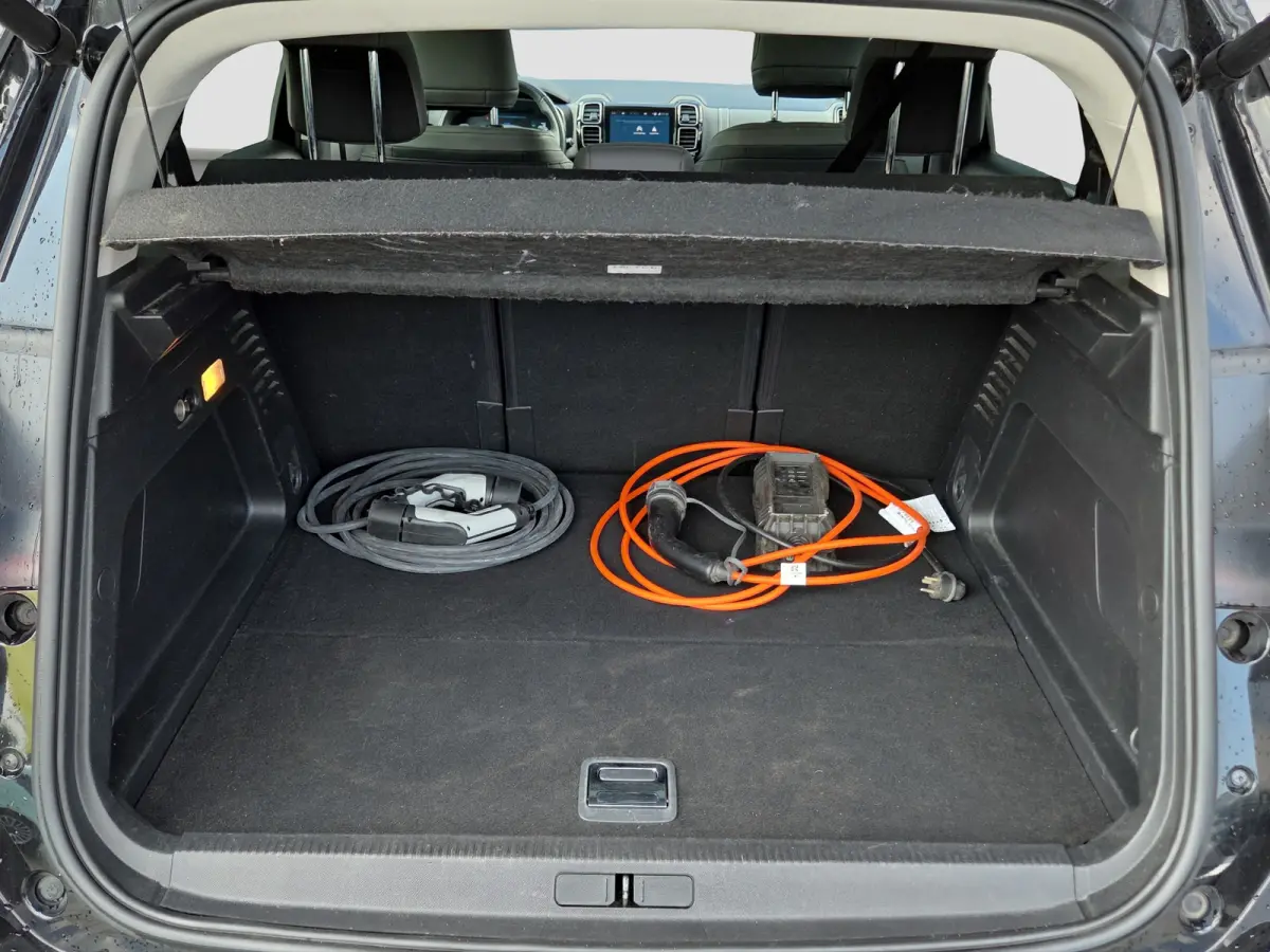 1.6 Plug-in Hybrid 225 Business Plus Panoramadak | Trekhaak | Elektrische stoelverstelling + memory | Voor en achter camera | Voorstoelen verwarmd