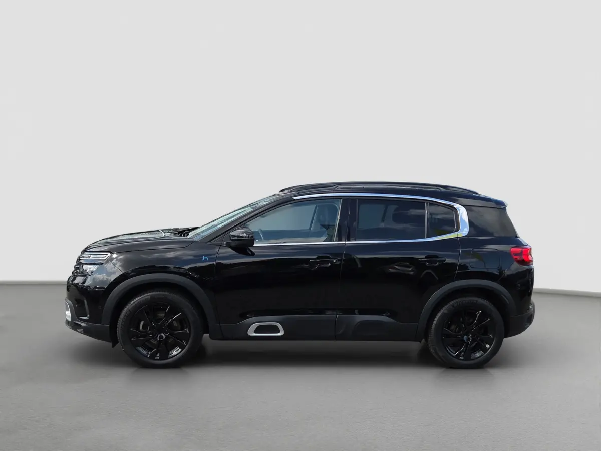 1.6 Plug-in Hybrid 225 Business Plus Panoramadak | Trekhaak | Elektrische stoelverstelling + memory | Voor en achter camera | Voorstoelen verwarmd
