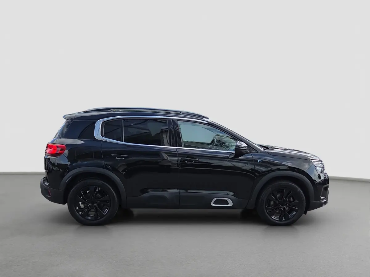1.6 Plug-in Hybrid 225 Business Plus Panoramadak | Trekhaak | Elektrische stoelverstelling + memory | Voor en achter camera | Voorstoelen verwarmd