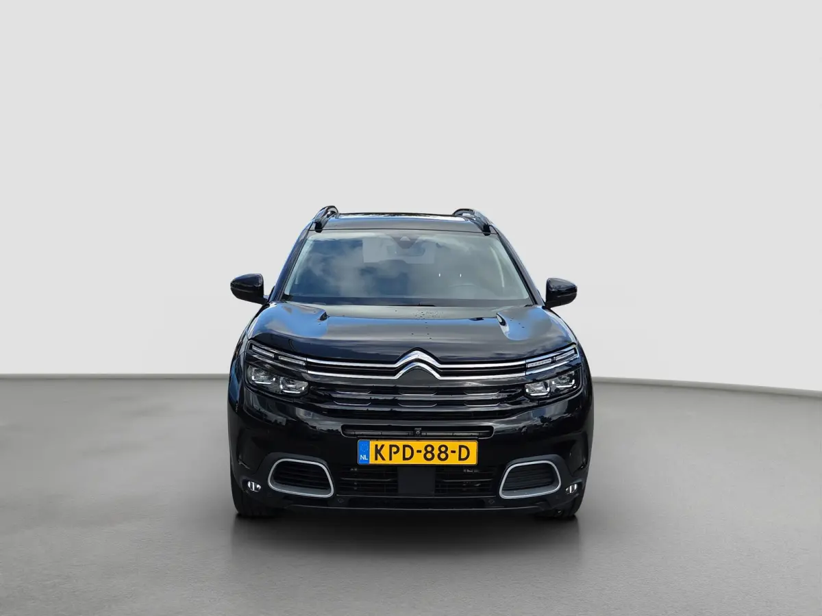 1.6 Plug-in Hybrid 225 Business Plus Panoramadak | Trekhaak | Elektrische stoelverstelling + memory | Voor en achter camera | Voorstoelen verwarmd