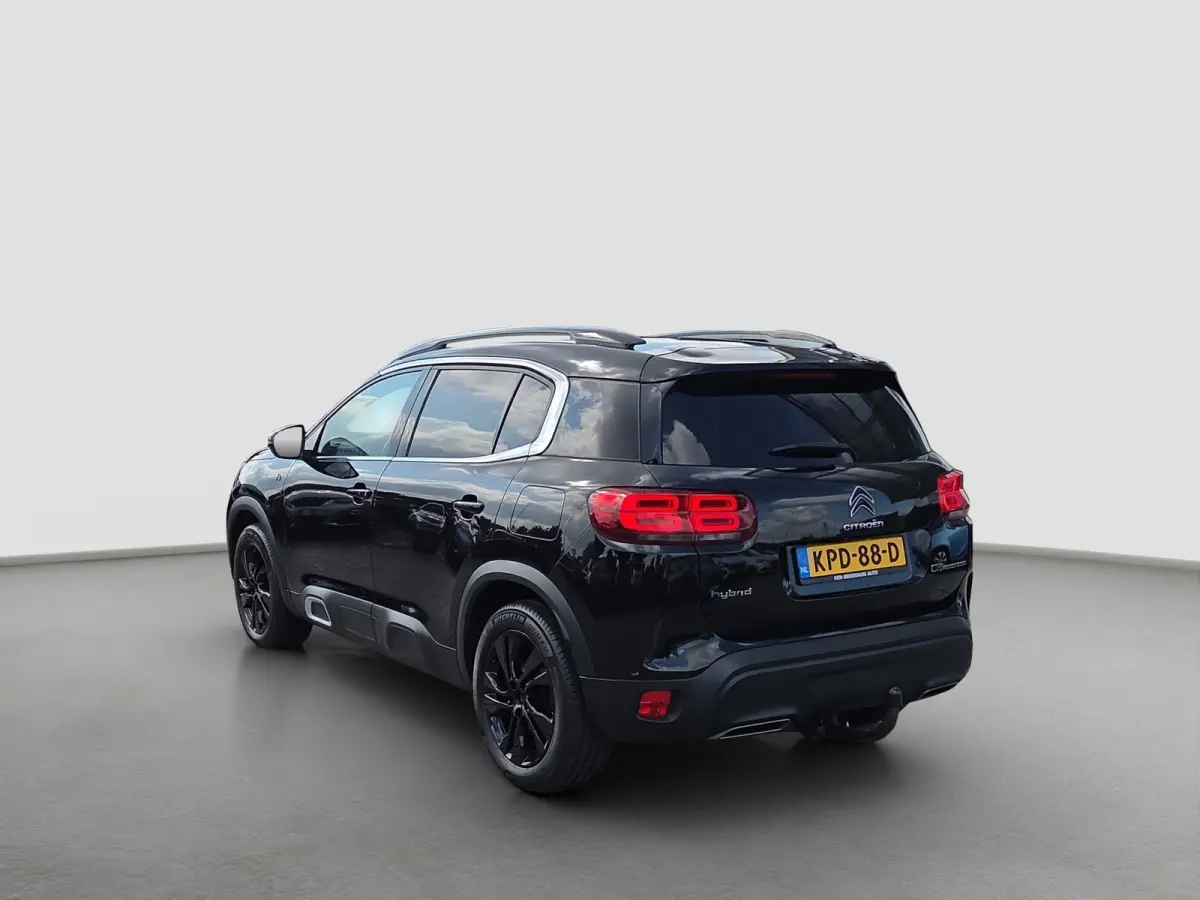 1.6 Plug-in Hybrid 225 Business Plus Panoramadak | Trekhaak | Elektrische stoelverstelling + memory | Voor en achter camera | Voorstoelen verwarmd