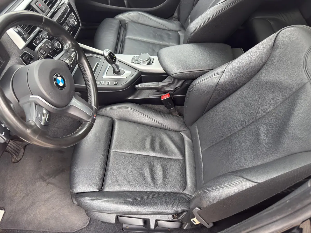 118i Edition M Sport Shadow High Executive | Leder | Schuif/kanteldak | Led | Parksenors V+A | Stoelverw |