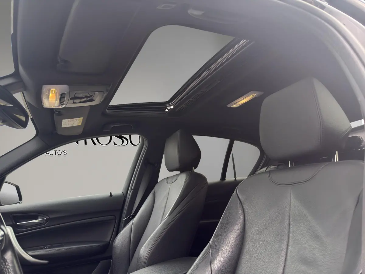 118i Edition M Sport Shadow High Executive | Leder | Schuif/kanteldak | Led | Parksenors V+A | Stoelverw |