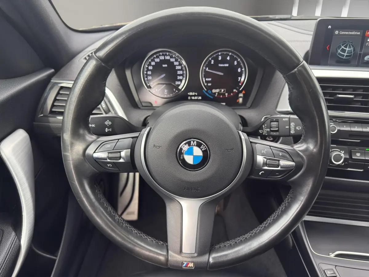 118i Edition M Sport Shadow High Executive | Leder | Schuif/kanteldak | Led | Parksenors V+A | Stoelverw |