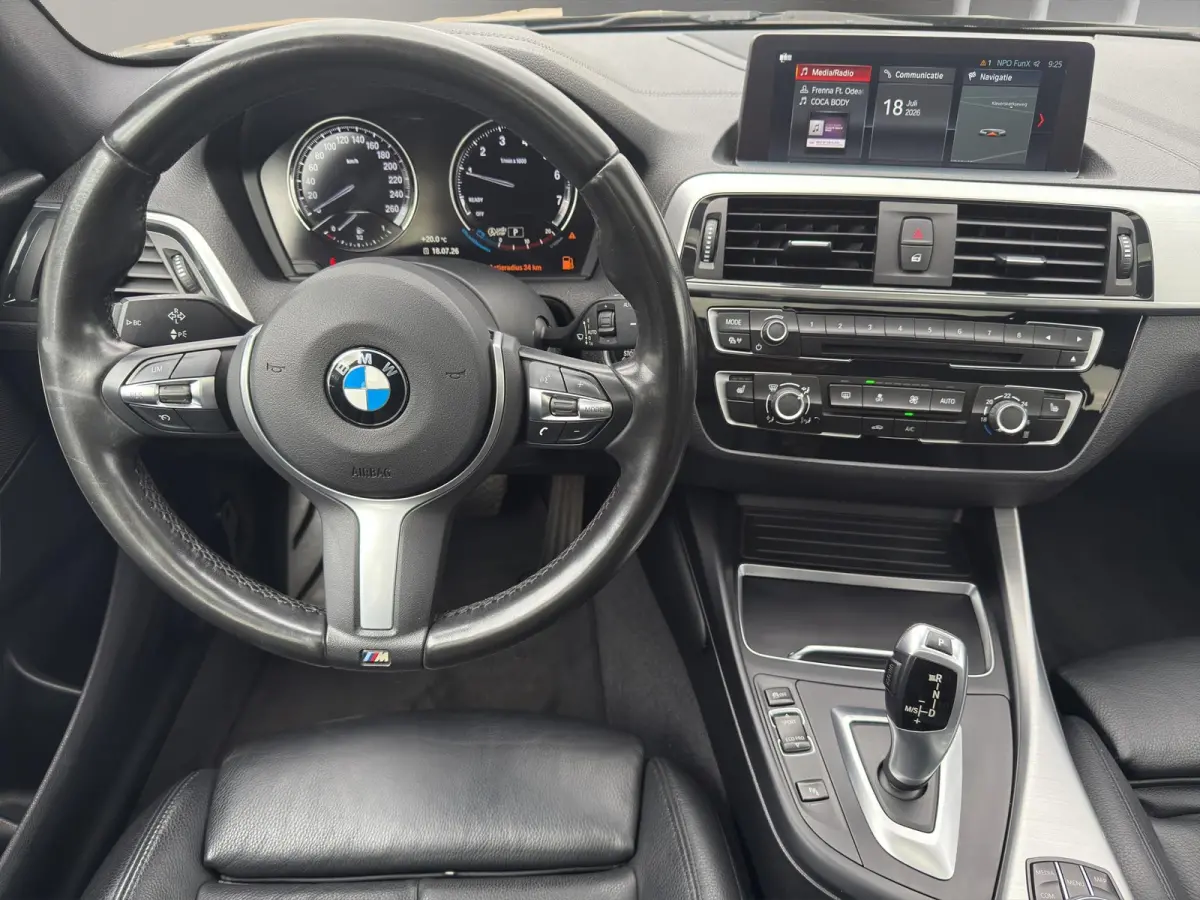 118i Edition M Sport Shadow High Executive | Leder | Schuif/kanteldak | Led | Parksenors V+A | Stoelverw |