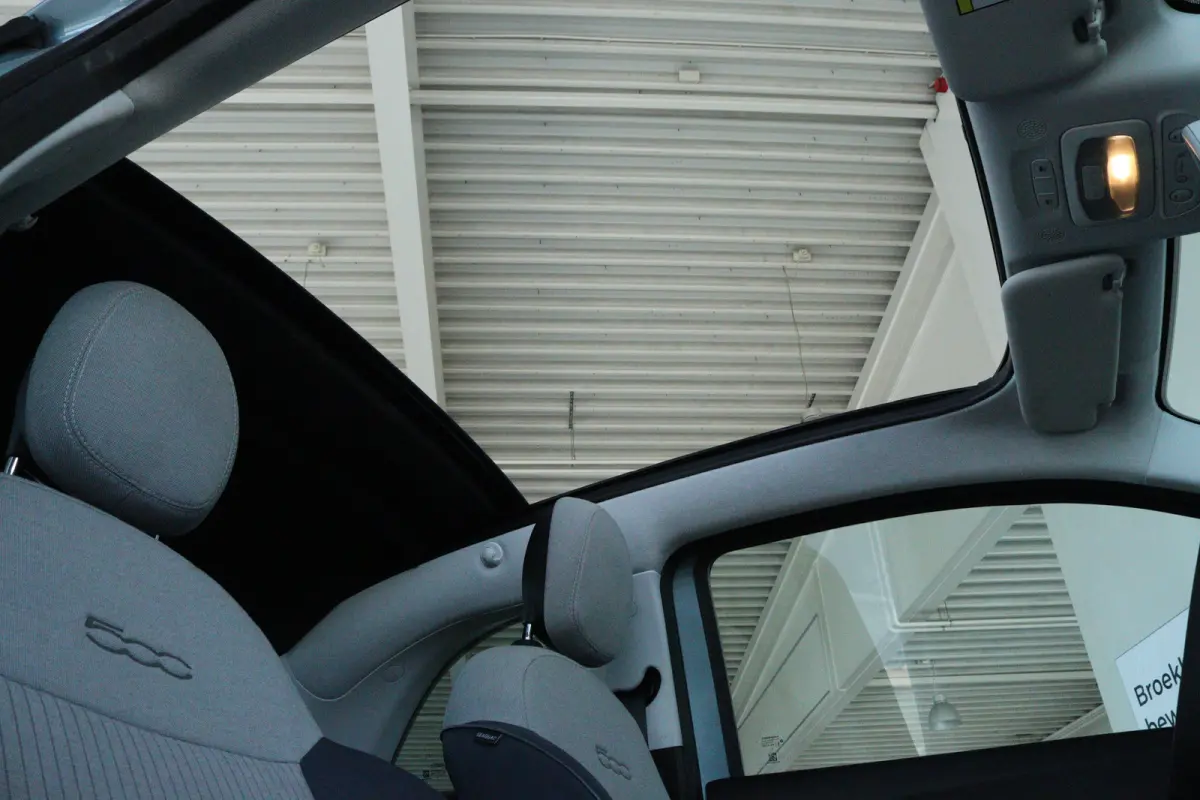 Passion 42 kWh | Cruise Control | Elektrische Kap | Keyless | LED | 17 Inch | Navi | Carplay | Climate | Sensoren