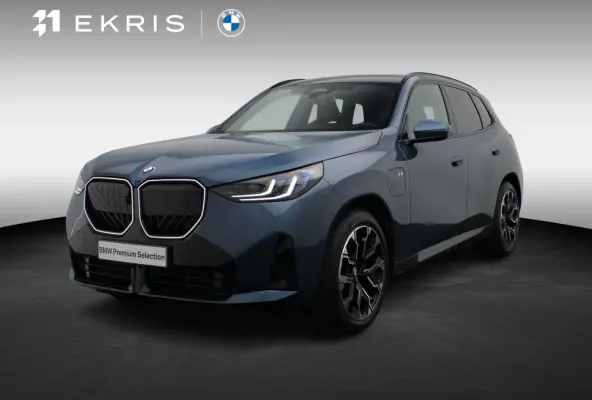 30e xDrive M Sportpakket Pro | SoH 100% | Professional Pack | Comfort Pack | Premium Pack | Trekhaak | Panoramadak | 	Driving Assistant Plus | Harman Kardon | 20''