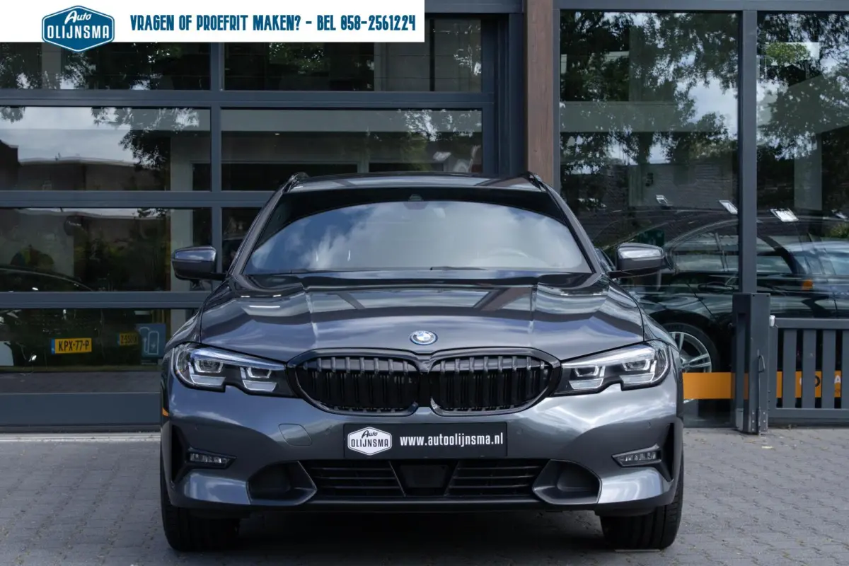 330E xDrive Sportline|Stuur+stoelverwarming|Trekhaak|Shadow Line|Adaptive Cruise|