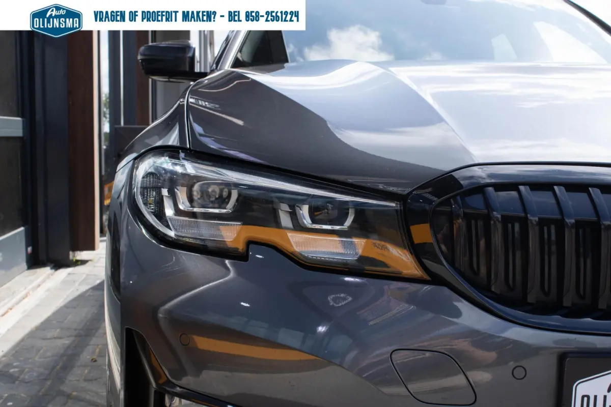 330E xDrive Sportline|Stuur+stoelverwarming|Trekhaak|Shadow Line|Adaptive Cruise|