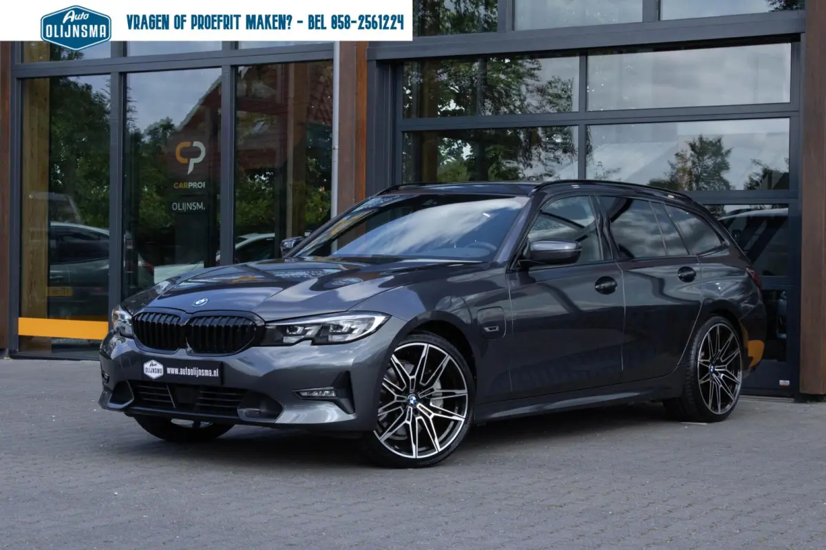 330E xDrive Sportline|Stuur+stoelverwarming|Trekhaak|Shadow Line|Adaptive Cruise|