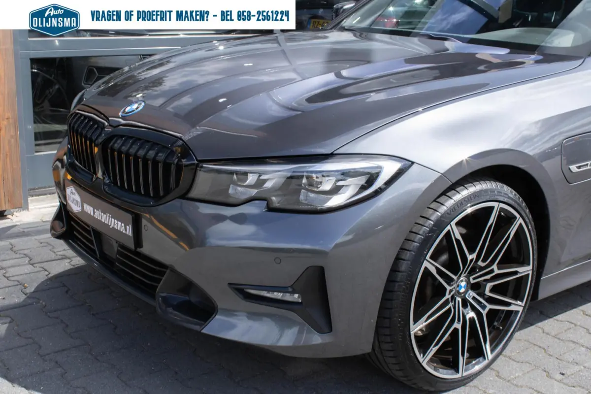 330E xDrive Sportline|Stuur+stoelverwarming|Trekhaak|Shadow Line|Adaptive Cruise|