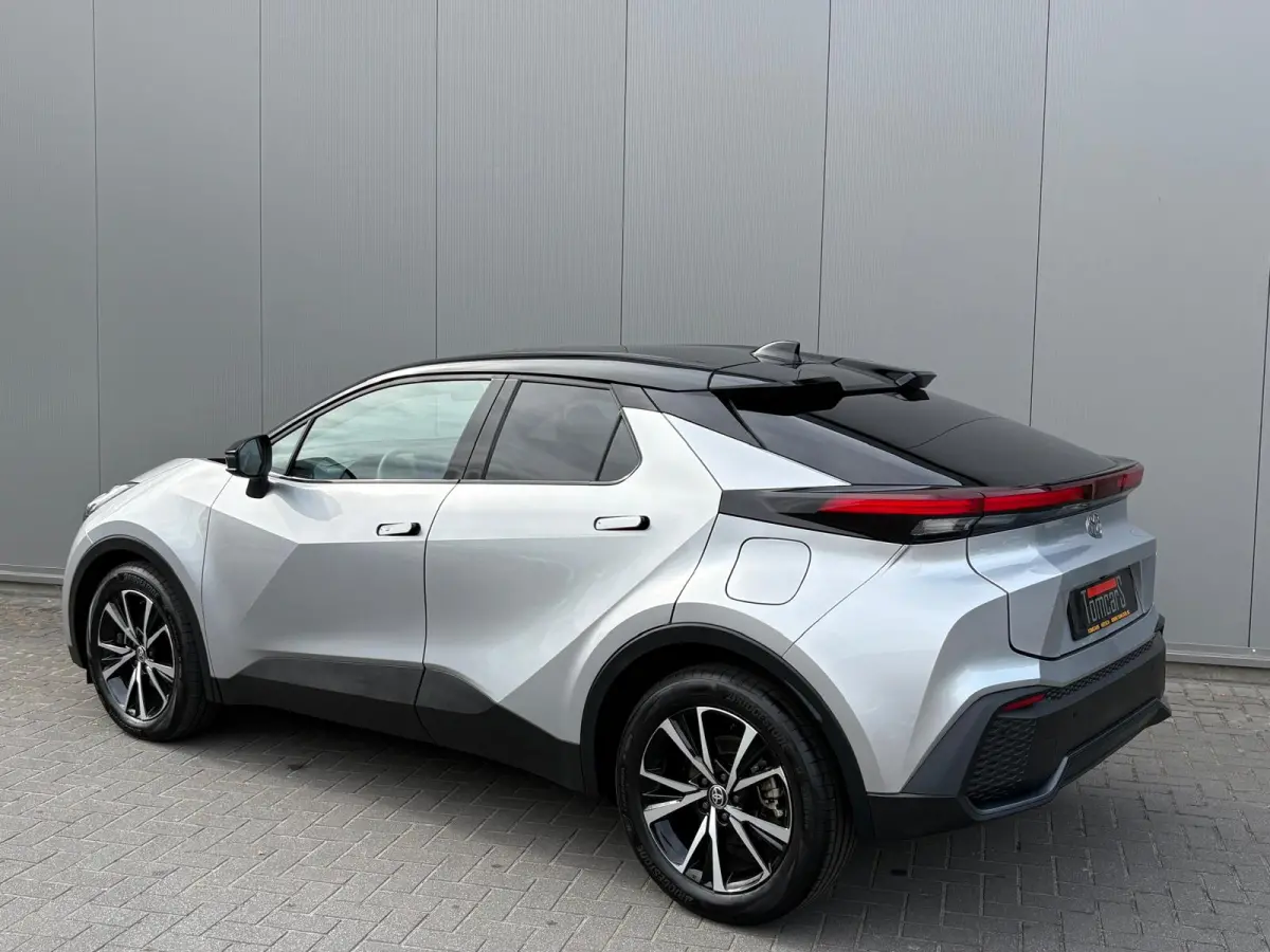 1.8 Hybrid 140PK First Edition Bi-Tone/Winter-pack/Gr.-navigatie/Elektr.klep/Camera/Adapt.-cruise
