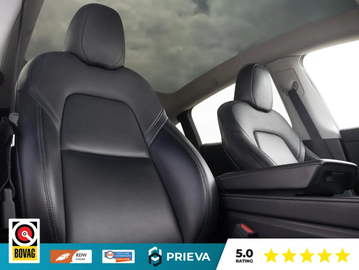 Tesla Long Range AWD | 513 pk | 2023 | Trekhaak | Panorama | Dealer onderhouden Tesla Model Y Long Range AWD | 513 pk | 2023 | Trekhaak | Panorama | Dealer onderhouden