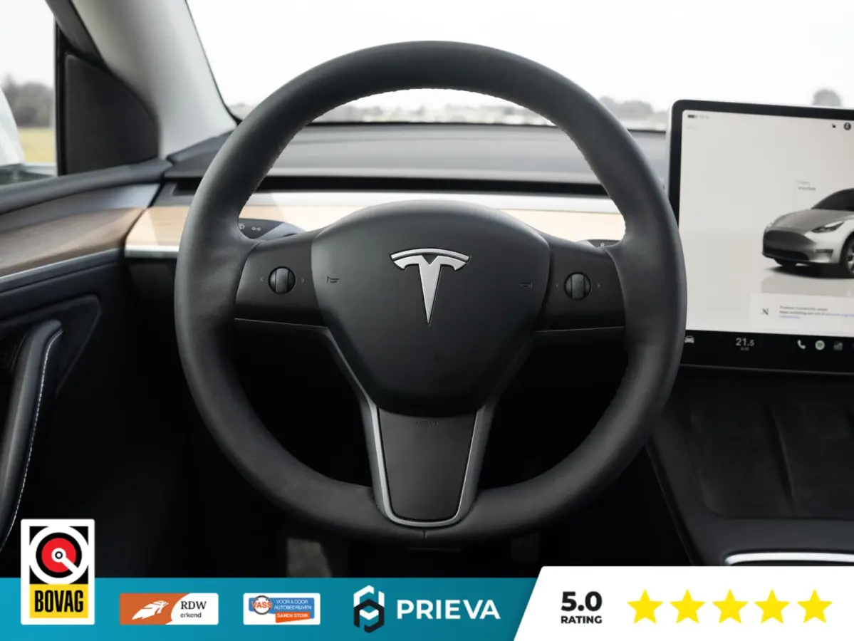 Tesla Long Range AWD | 513 pk | 2023 | Trekhaak | Panorama | Dealer onderhouden Tesla Model Y Long Range AWD | 513 pk | 2023 | Trekhaak | Panorama | Dealer onderhouden