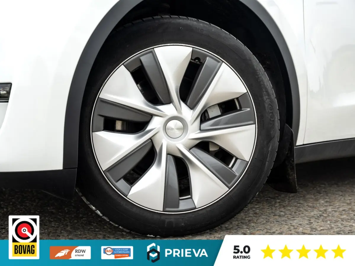Tesla Long Range AWD | 513 pk | 2023 | Trekhaak | Panorama | Dealer onderhouden Tesla Model Y Long Range AWD | 513 pk | 2023 | Trekhaak | Panorama | Dealer onderhouden