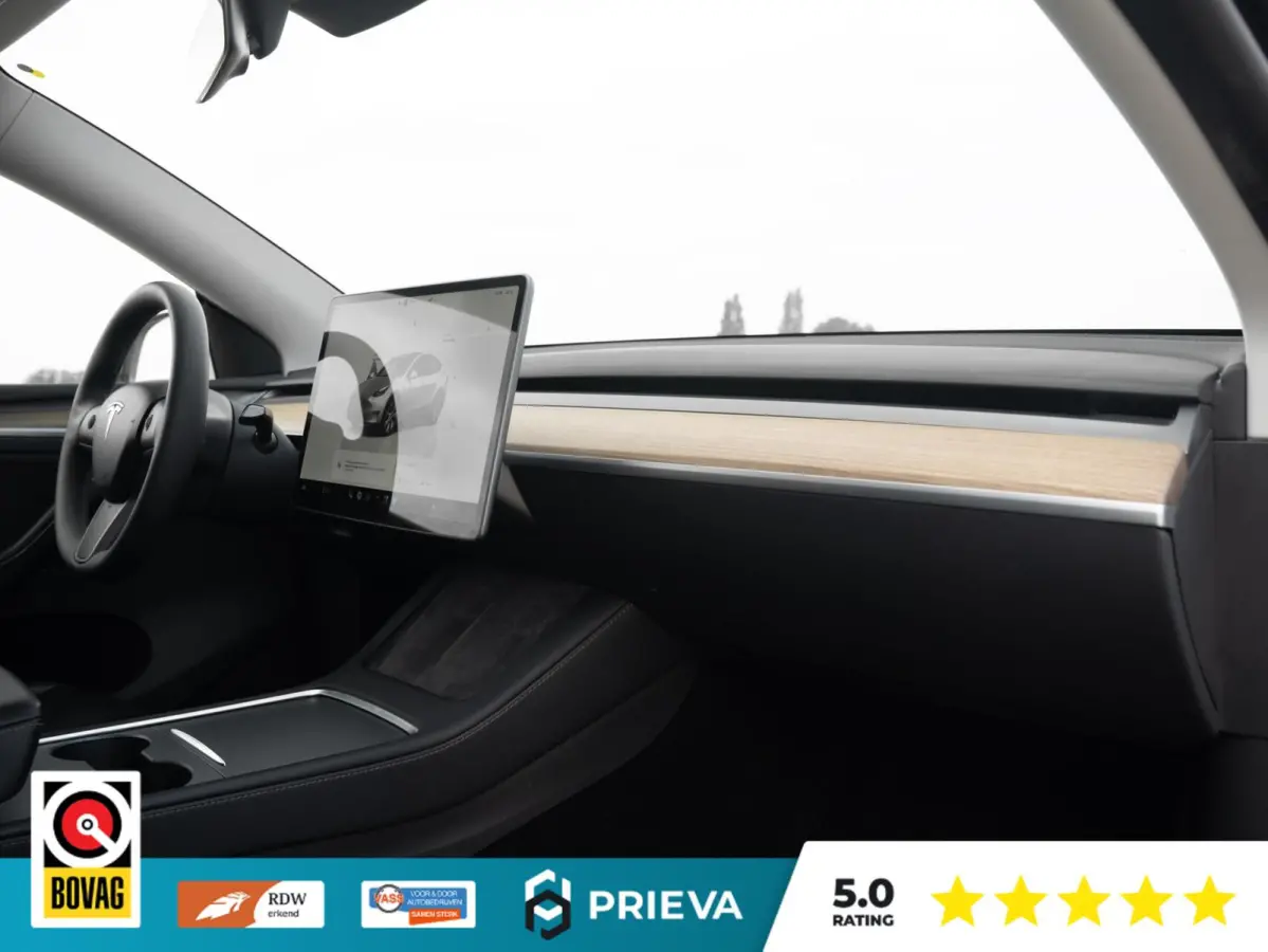 Tesla Long Range AWD | 513 pk | 2023 | Trekhaak | Panorama | Dealer onderhouden Tesla Model Y Long Range AWD | 513 pk | 2023 | Trekhaak | Panorama | Dealer onderhouden