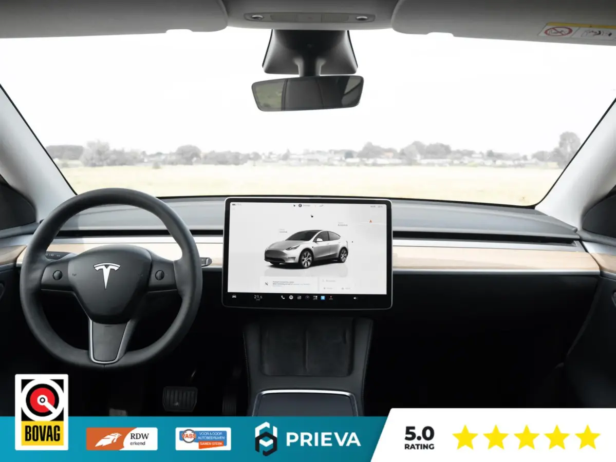 Tesla Long Range AWD | 513 pk | 2023 | Trekhaak | Panorama | Dealer onderhouden Tesla Model Y Long Range AWD | 513 pk | 2023 | Trekhaak | Panorama | Dealer onderhouden