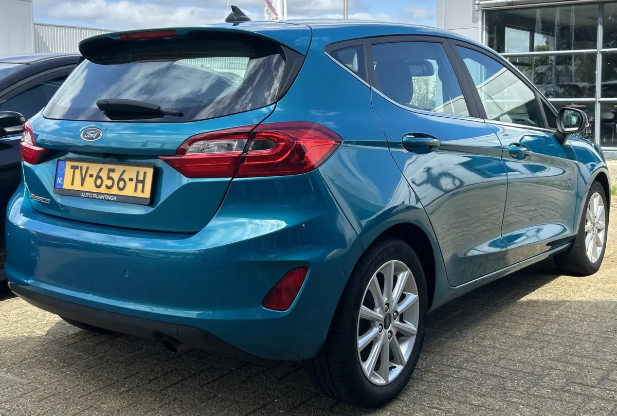1.0 EcoBoost Titanium 101PK | LUXE | Achteruitrijcamera | B&O Audio | Climate Control | Navigatie | Adaptive Cruise Control | Voorruitverwarming | Parkeersensoren Voor en Achter | Lichtmetal