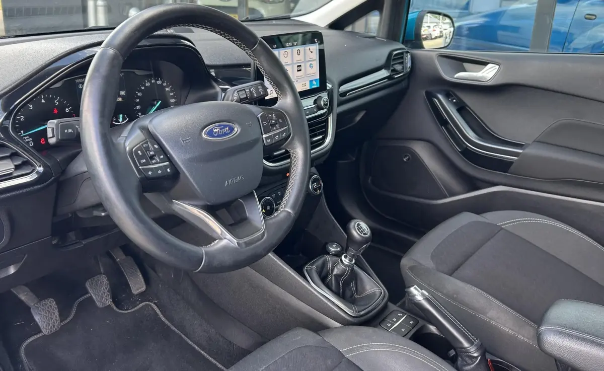 1.0 EcoBoost Titanium 101PK | LUXE | Achteruitrijcamera | B&O Audio | Climate Control | Navigatie | Adaptive Cruise Control | Voorruitverwarming | Parkeersensoren Voor en Achter | Lichtmetal