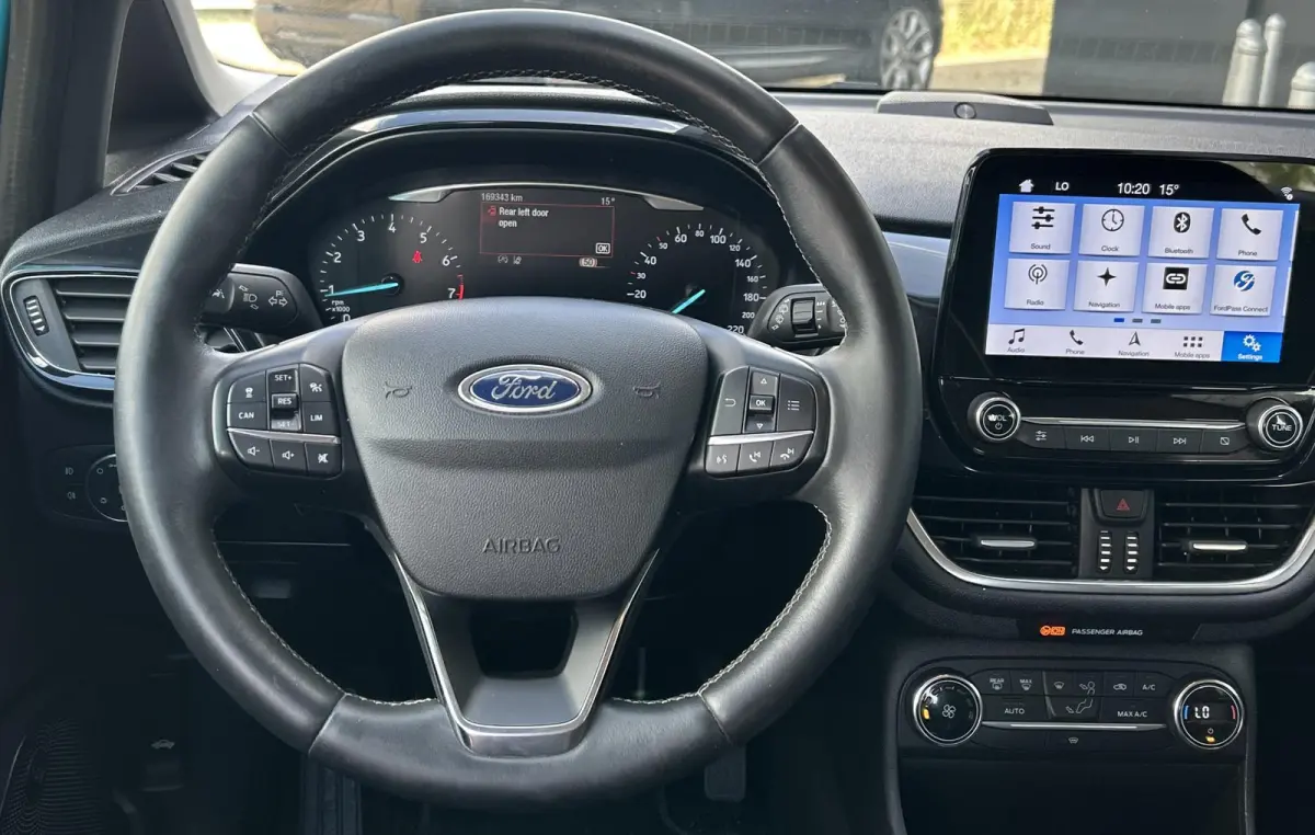 1.0 EcoBoost Titanium 101PK | LUXE | Achteruitrijcamera | B&O Audio | Climate Control | Navigatie | Adaptive Cruise Control | Voorruitverwarming | Parkeersensoren Voor en Achter | Lichtmetal