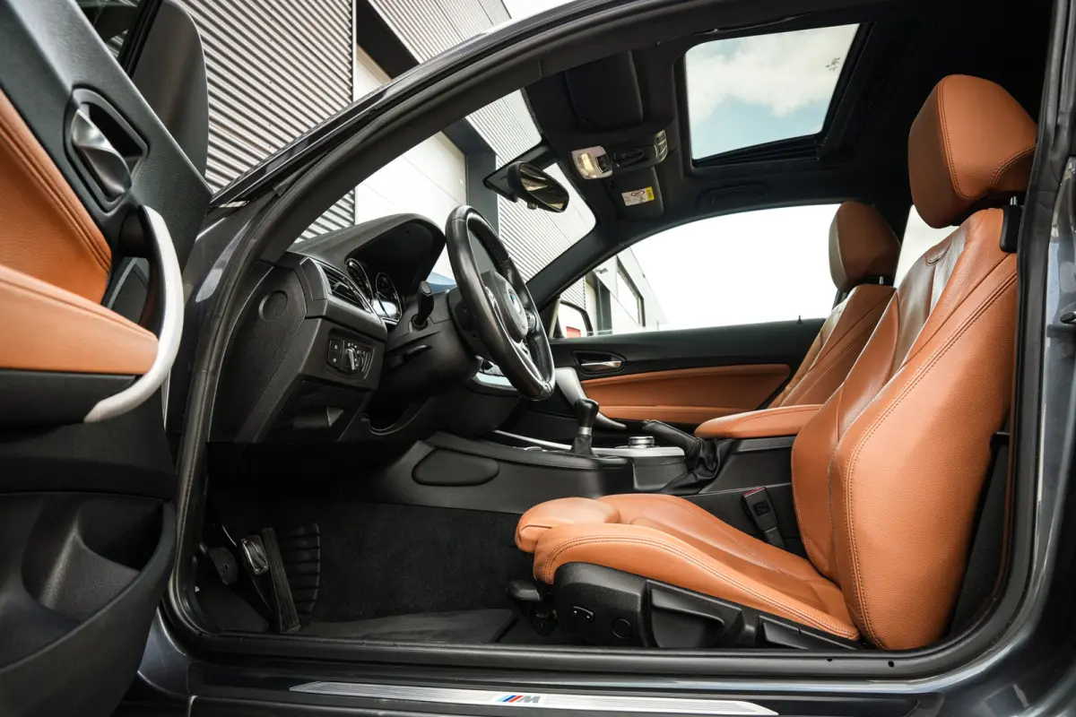 118i Edition M Sport Shadow High Executive | Schuifdak | Leder | Clima | CC | Metalic | Navi prof. | Mooi! |