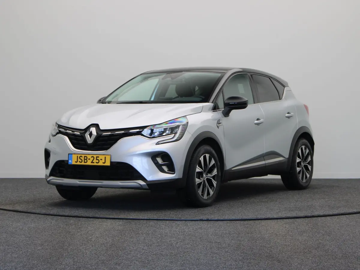 1.6 E-Tech Hybrid 145 Techno | LED | Clima | Keyless | Achteruitrijcamera | Groot scherm |