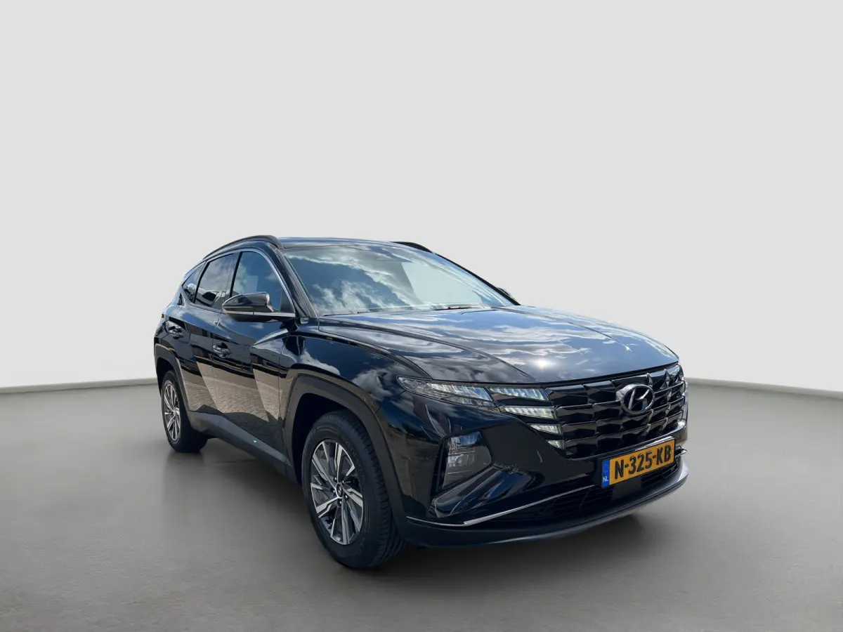 1.6 T-GDI 230pk HEV Comfort | Camera | Carplay | Elektrische spiegels | Keyless entry | Trekhaak | LED koplampen | Navigatie | Parkeersensoren | Stoelverwarming