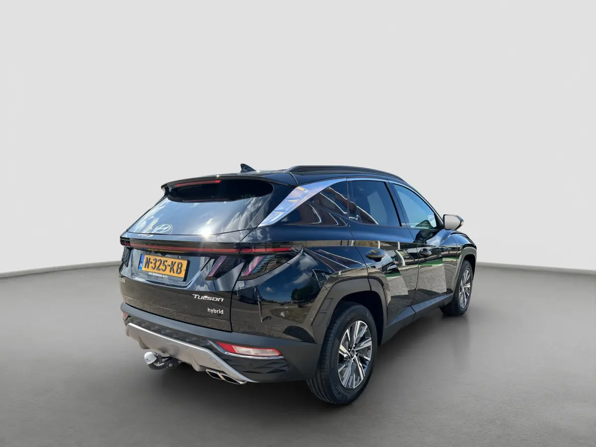1.6 T-GDI 230pk HEV Comfort | Camera | Carplay | Elektrische spiegels | Keyless entry | Trekhaak | LED koplampen | Navigatie | Parkeersensoren | Stoelverwarming